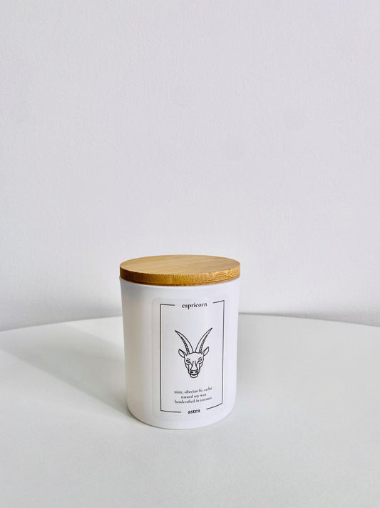 A Capricorn candle, depicting a goat's head, scented mint, Siberian fir and cedar